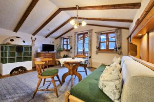 Wohnzimmer mit integr. Küche -  Ferienwohnung Blaueis im Oslhof