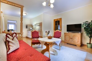 Wohnzimmer mit integr. Küche -  Ferienwohnung Reiteralpe im Oslhof